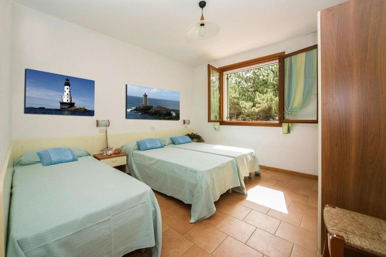 Terraced House In The Ca' Del Pino Holiday Complex With Communal Pool In Bibione Bagian luar foto